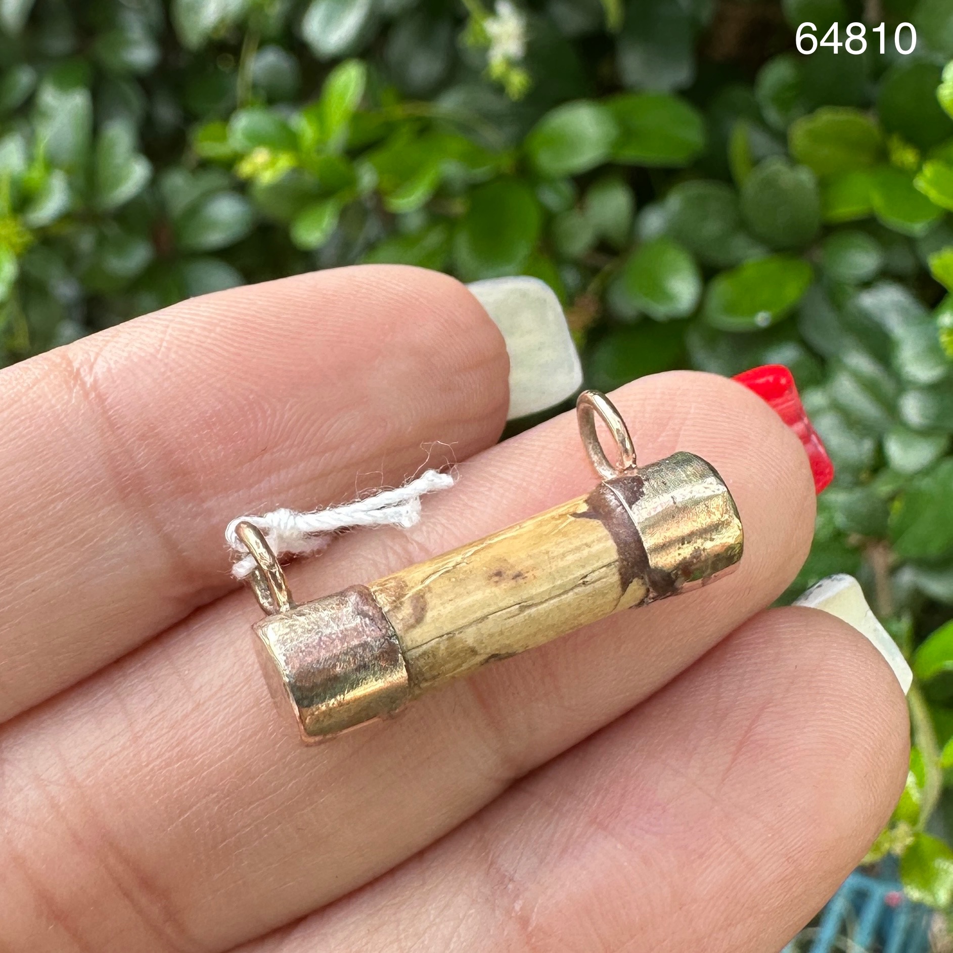 รหัส 64810 ตะกรุด หวายลูกนิมิตร เลี่ยมนาก งานเก่า หายาก น่าสะสม นน. 1.00 g