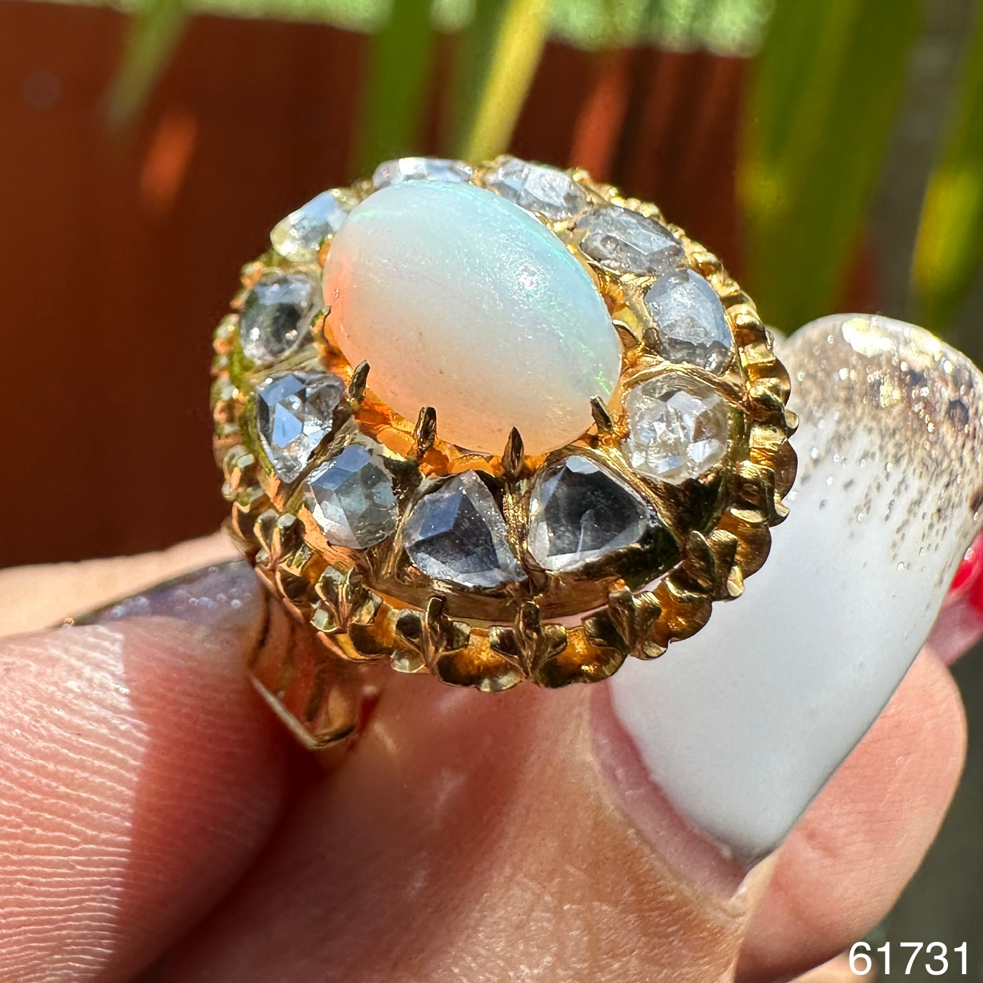 รหัส 61731 แหวน โอปอล ล้อมเพชรซีกลูกโลก เพชรหนา ทอง90 งานสวยมาก นน. 8.05 g