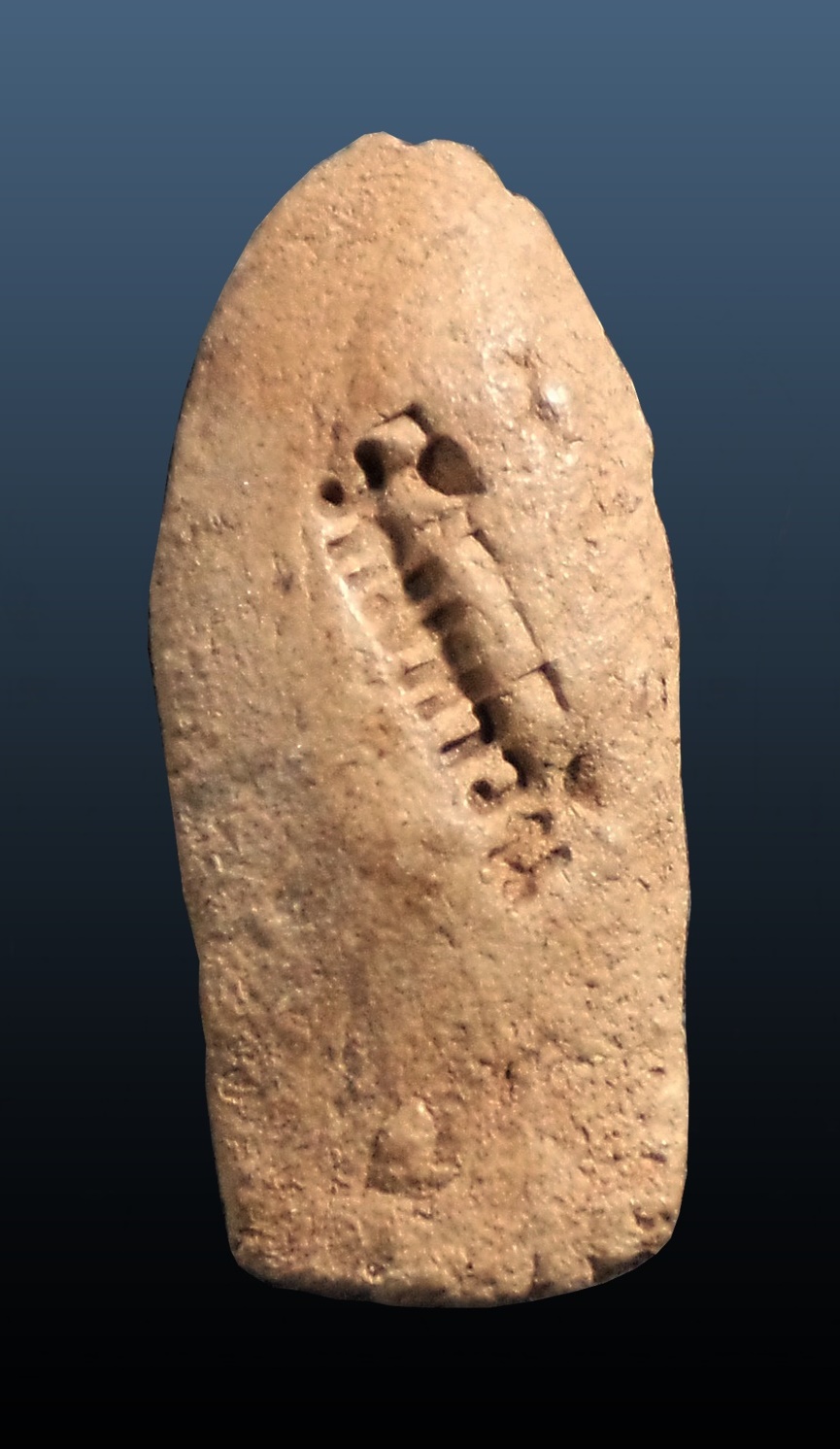 พระรอดเนื้อดินหลังปั๊มวัดมหาวัน จ.ลำพูน ปี 2525