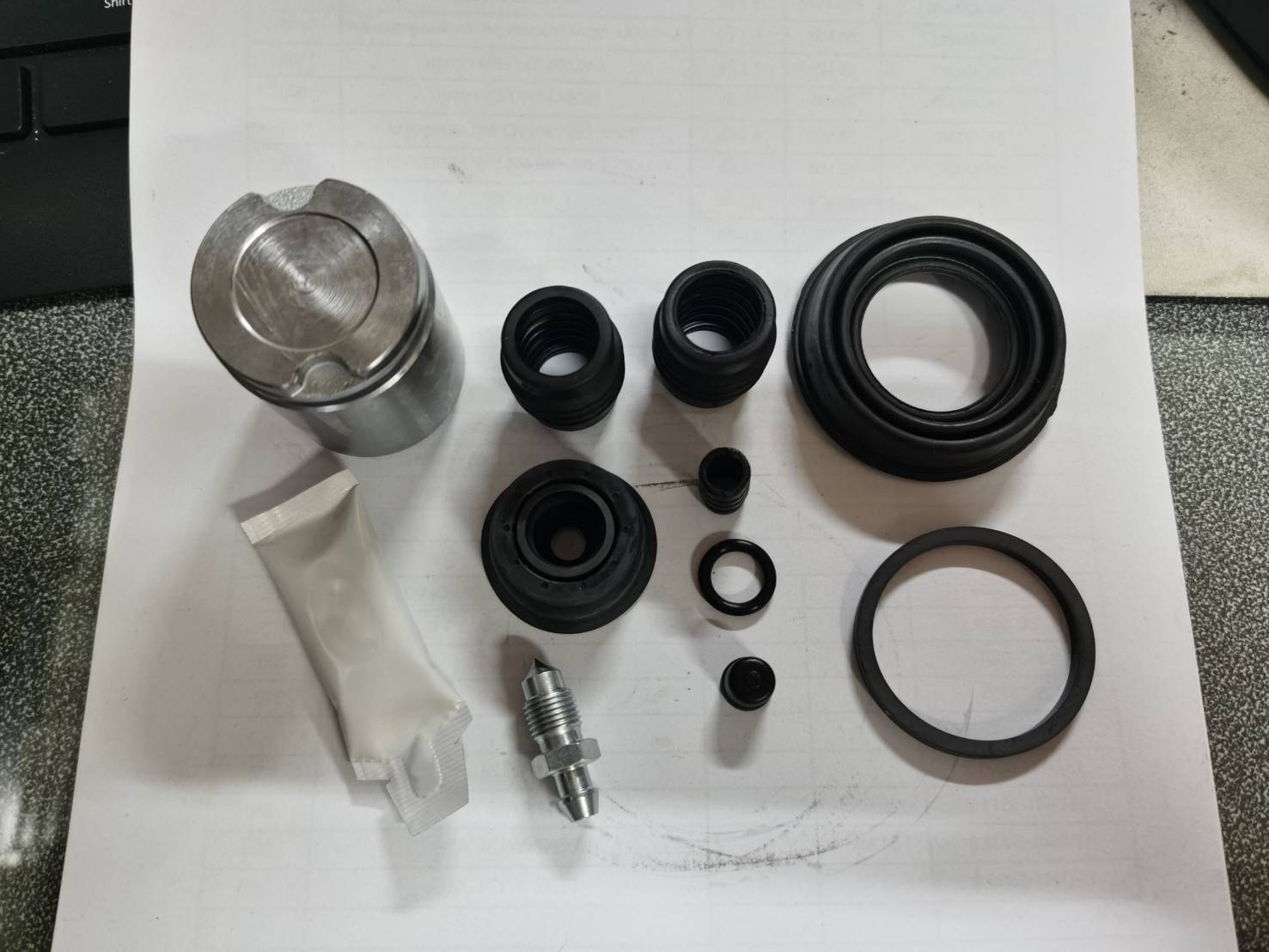 ยางดิสเบรคหลัง + ลูกสูบดิสเบรค CRUZE /AP