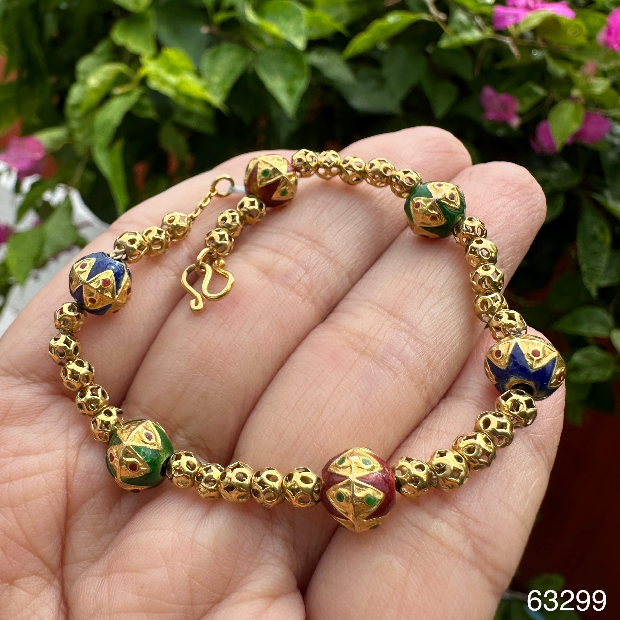 รหัส 63299 สร้อยข้อมือ ทองลงยา คั่นเม็ดประคำ ฉลุลาย รอบเส้น ทอง90 ความยาว 17.00 ซม. นน. 8.14 g