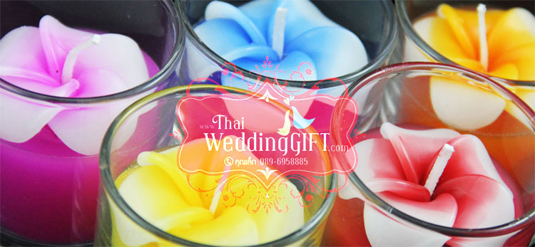 เทียนหอมดอกลีลาวดีบรรจุในแก้วใส แพ็คถุงแก้ว ผูกเชือกพร้อมใบไม้