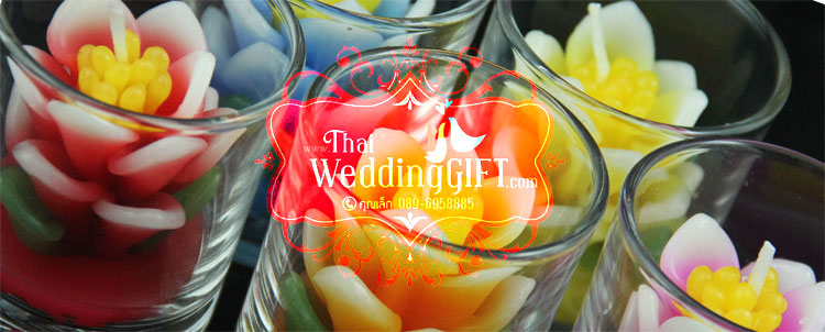 เทียนหอมดอกบัวบรรจุในแก้วใส แพ็คถุงแก้ว ผูกเชือกพร้อมใบไม้