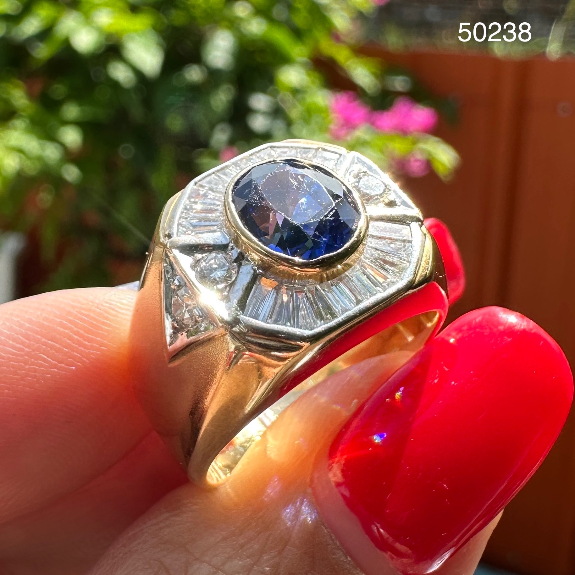 รหัส 50238 แหวน พลอยน้ำเงิน ล้อมเพชรแทปเปอร์ 22/0.50 ct ฝังเพชร 4/0.20 ct ทอง90 งานสวยมาก นน. 11.68 g