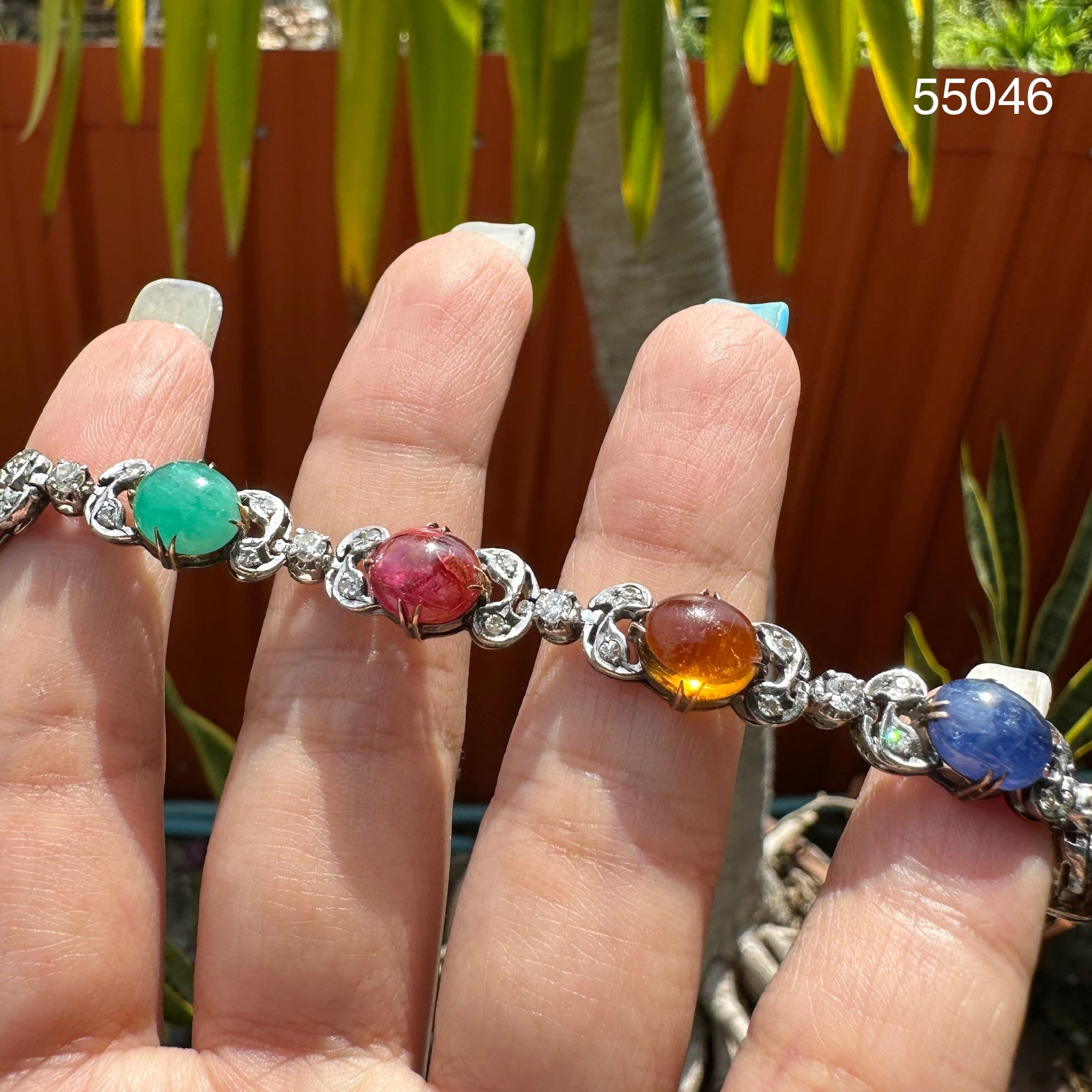 รหัส 55046 สร้อยข้อมือ นพเก้า คั่นเพชร 8 เม็ด 0.56 กะรัต ฝังเพชรกุหลาบ 32 เม็ด 0.48 กะรัต ทองK 2 สี นน. 17.12 g