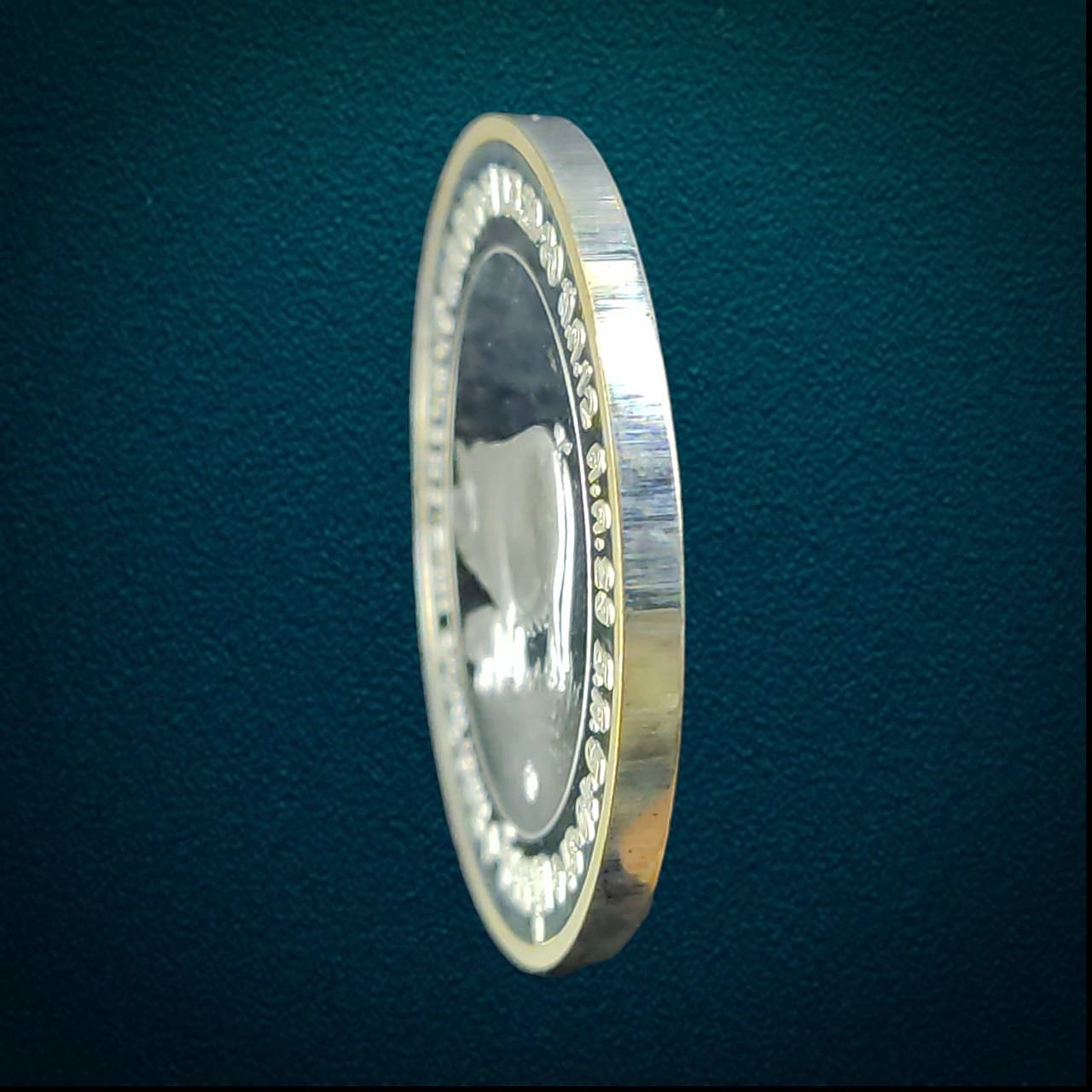 เหรียญวันหยุดปีหมูทอง ปี 2550 สร้างเนื่องในโอกาสฉลองสิริราชสมบัติครบ 60 ปี