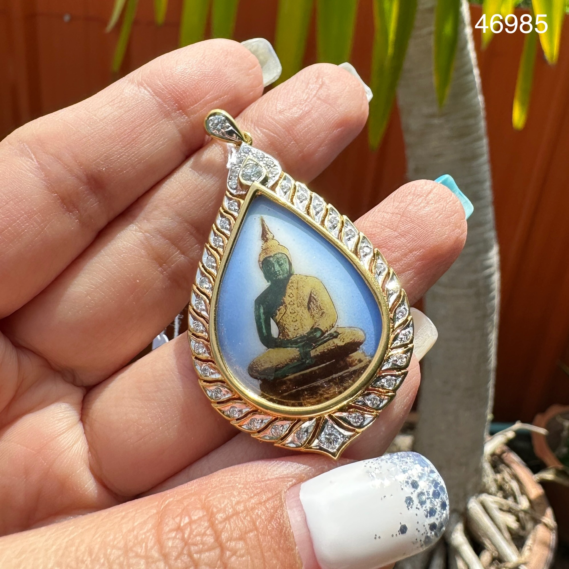 รหัส 46985 ล็อกเก็ต พระแก้วมรกต ล้อมเพชร 38 เม็ด 0.60 กะรัต ทองK 2 สี นน. 12.08 g