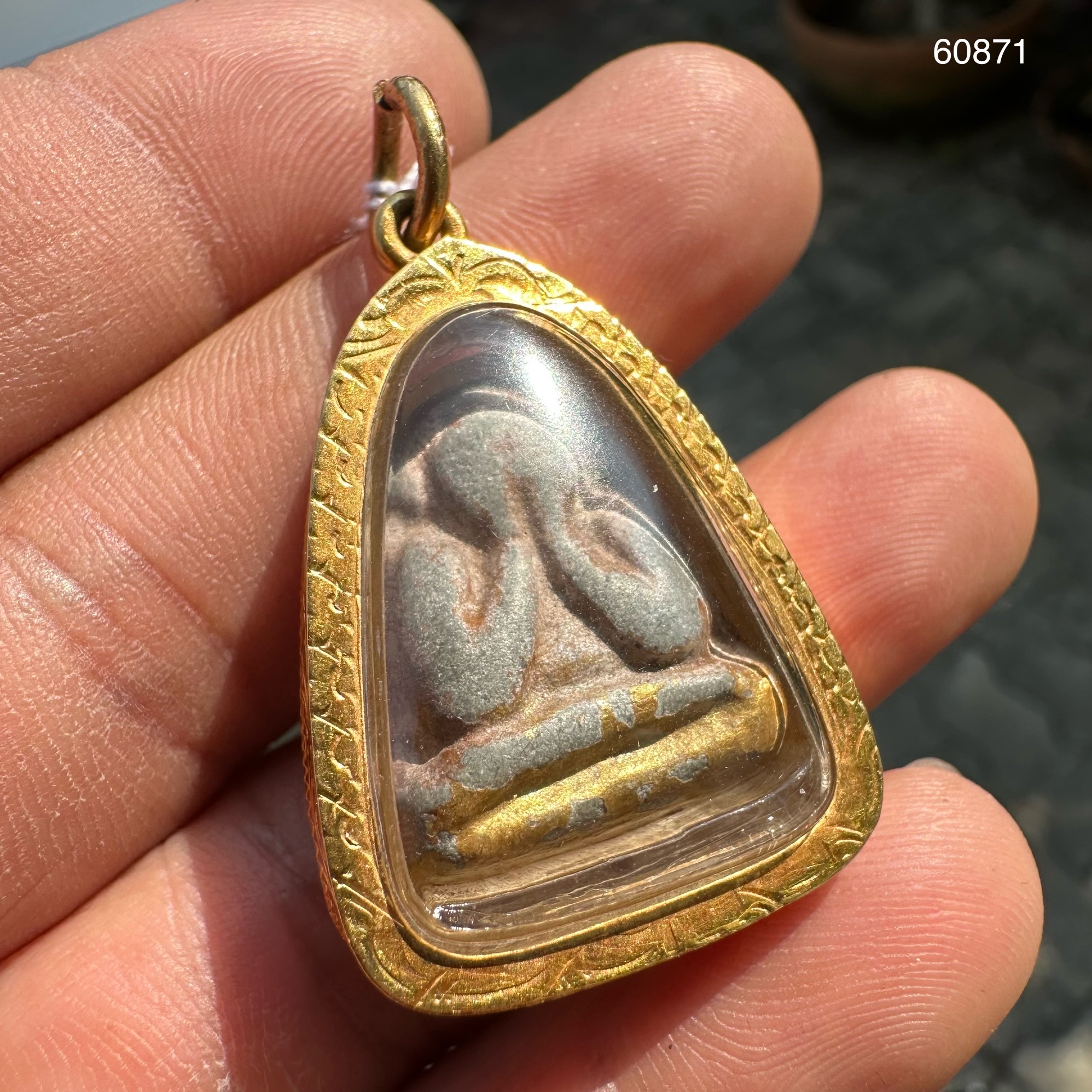 รหัส 60871 พระปิดตา หลังเแบบ ปิดทอง เลี่ยมทองเก่า นน. 7.60 g
