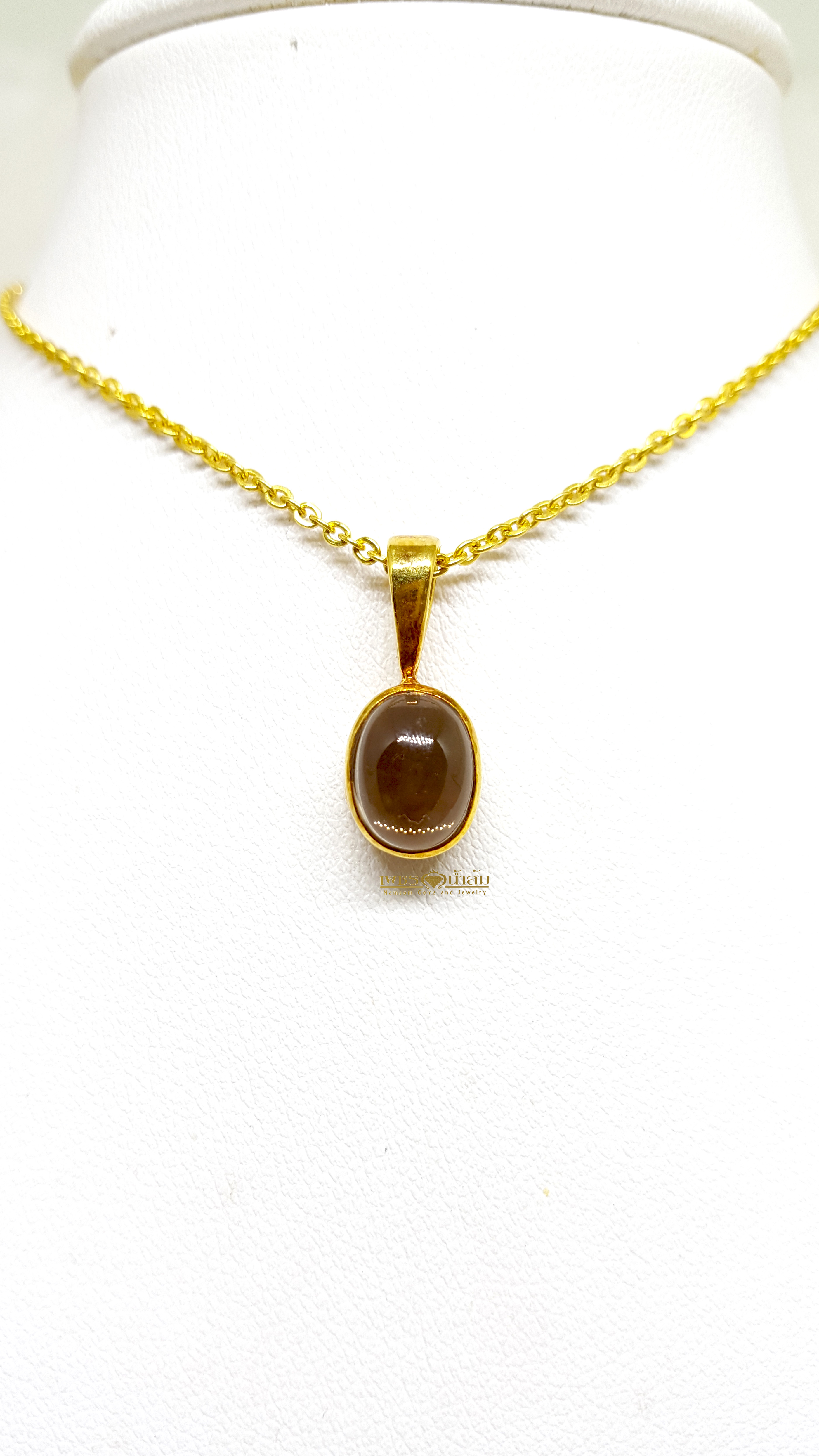 จี้ Smoky Topaz จากบ่อOuro Preto ประเทศ Brazil เจียรทรงคาบาชอน Cabochon