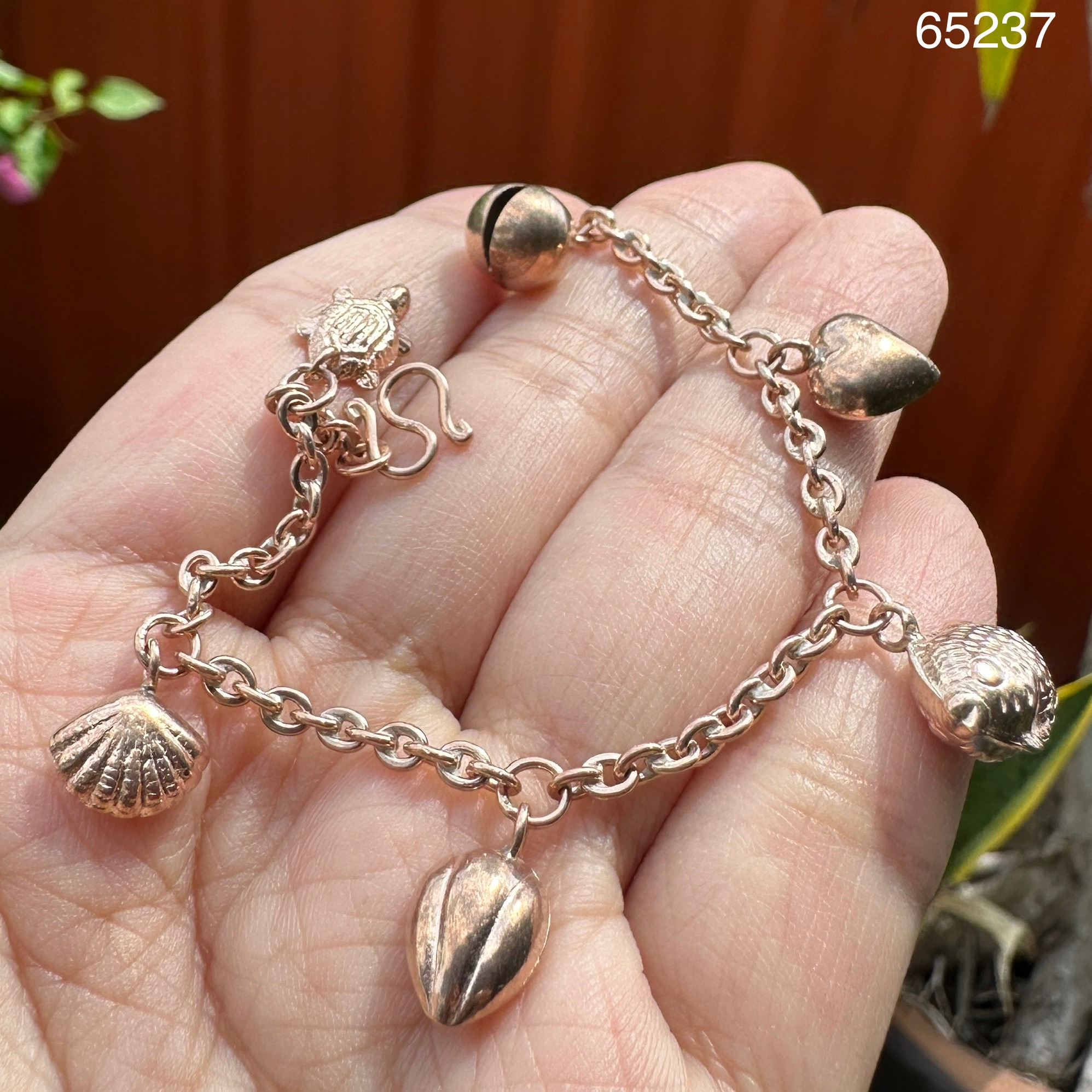 รหัส 65237 สร้อยข้อมือ นาก40 ลายกระพรวน หัวใจ ปลา มะเฟือง หอย เต่า ตุ้งติ้ง ยาว 16.00 ซม. มีเสียงดังกรุ๊งกริ๊ง
