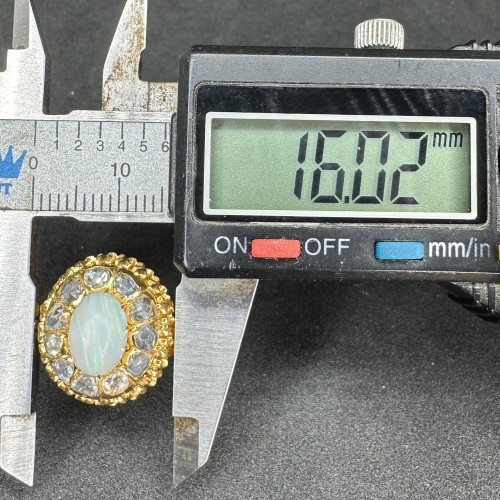 รหัส 61731 แหวน โอปอล ล้อมเพชรซีกลูกโลก เพชรหนา ทอง90 งานสวยมาก นน. 8.05 g