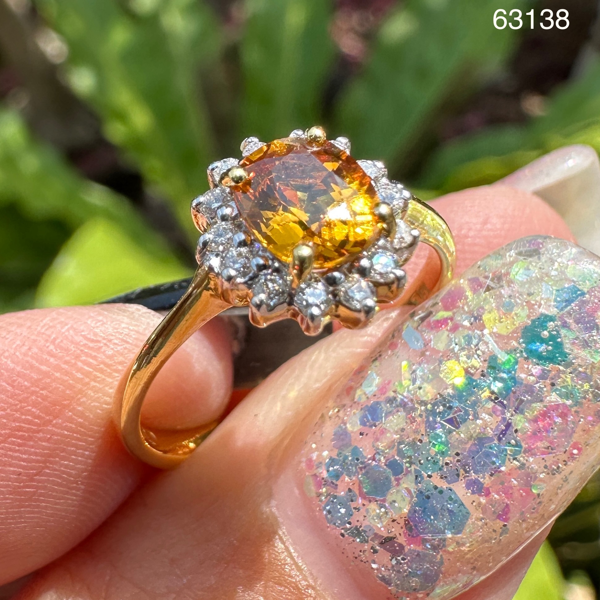 รหัส 63138 แหวน บุษราคัม ซีลอน 0.80 กะรัต ล้อมเพชร 14 เม็ด 0.14 กะรัต ทอง18K ขนาด 53 นน. 2.94 g