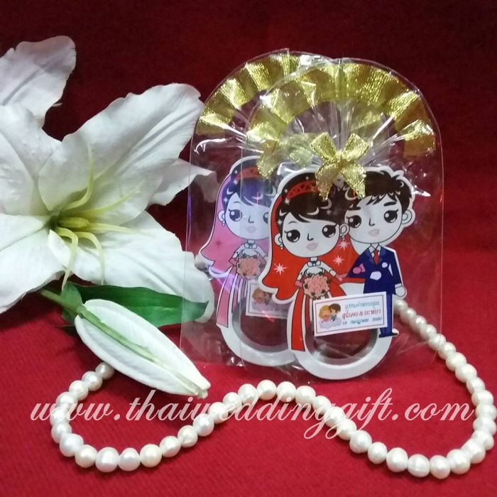 ที่เปิดขวดบ่าวสาวตาโตน่ารัก แพ็คถุงแก้ว ติดโบว์