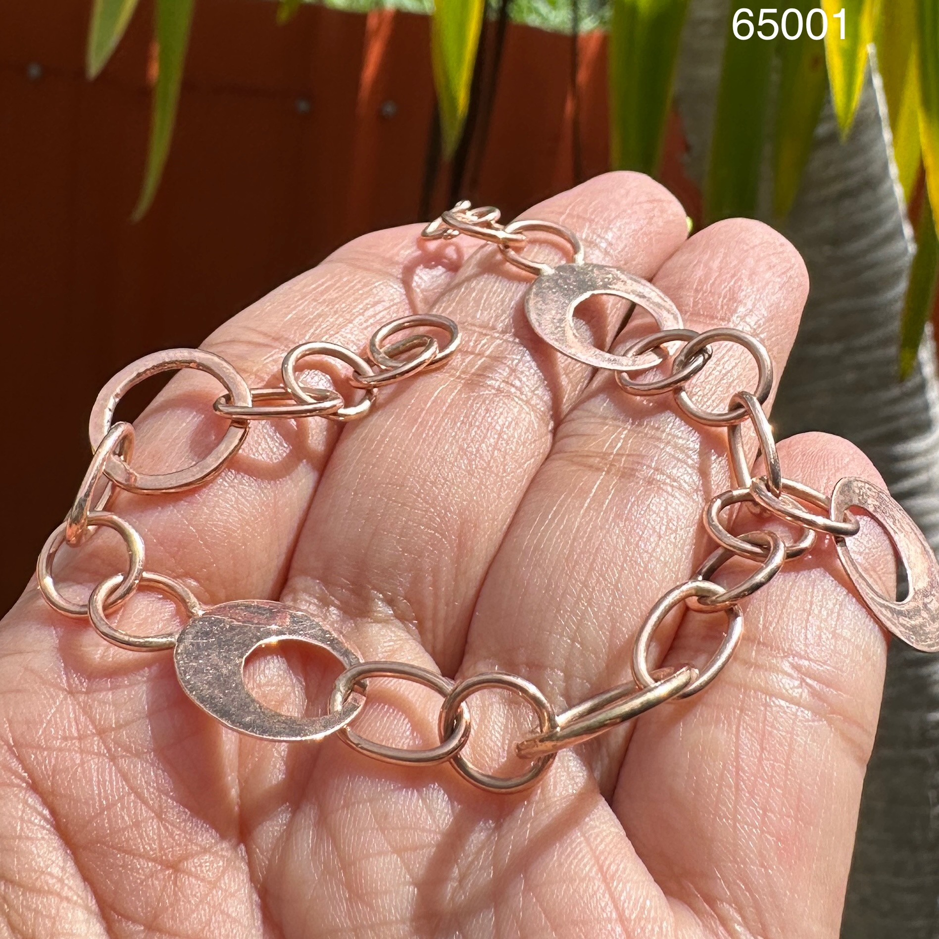 รหัส 65001 สร้อยข้อมือ นาก40 ตุ้งติ้ง ห่วงกลม ความยาว 17.00 ซม. นน. 8.95 g