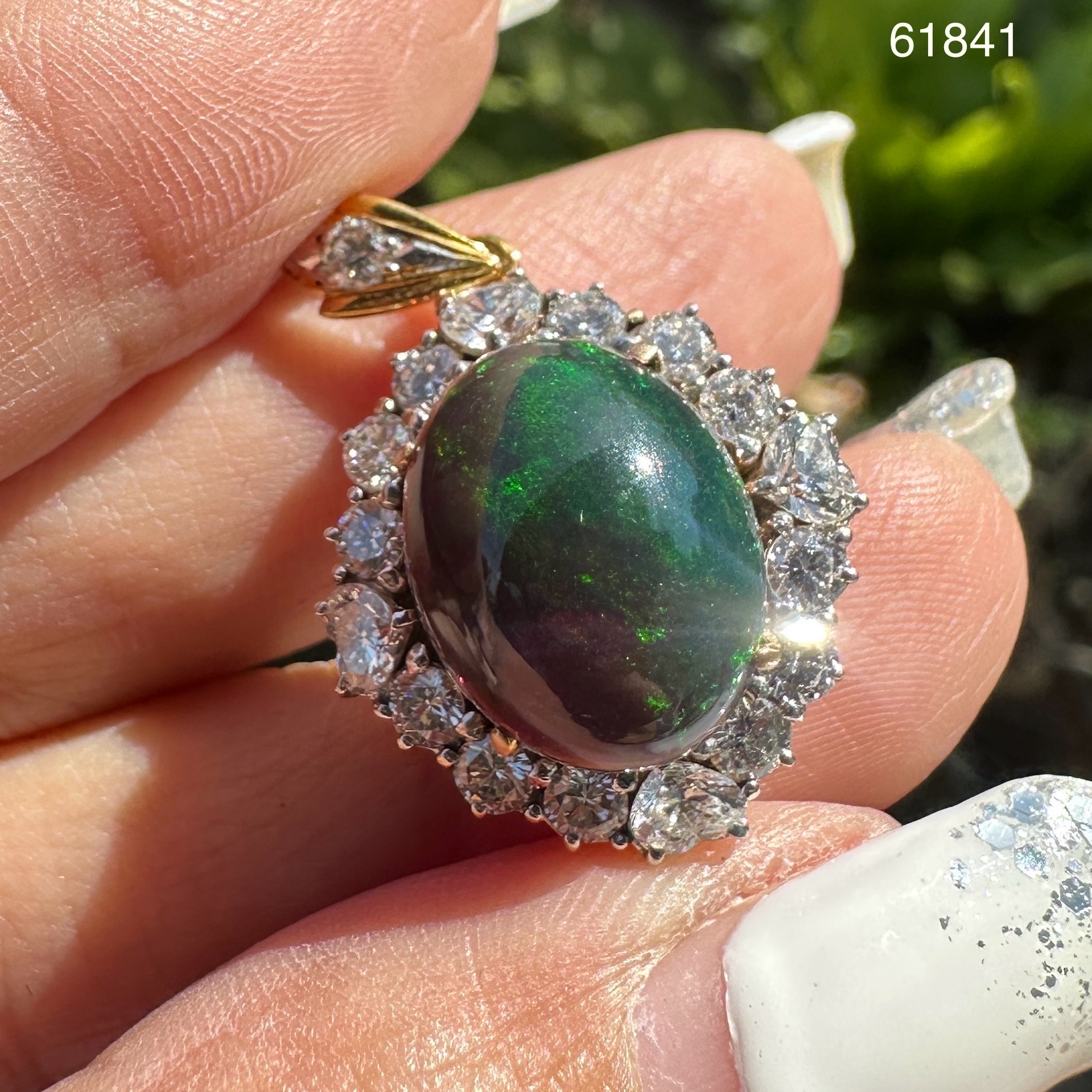 รหัส 61841 จี้ Black Opal 3.10 กะรัต ล้อมเพชร 17 เม็ด 1.61 กะรัต ทอง18K นน. 5.00 g