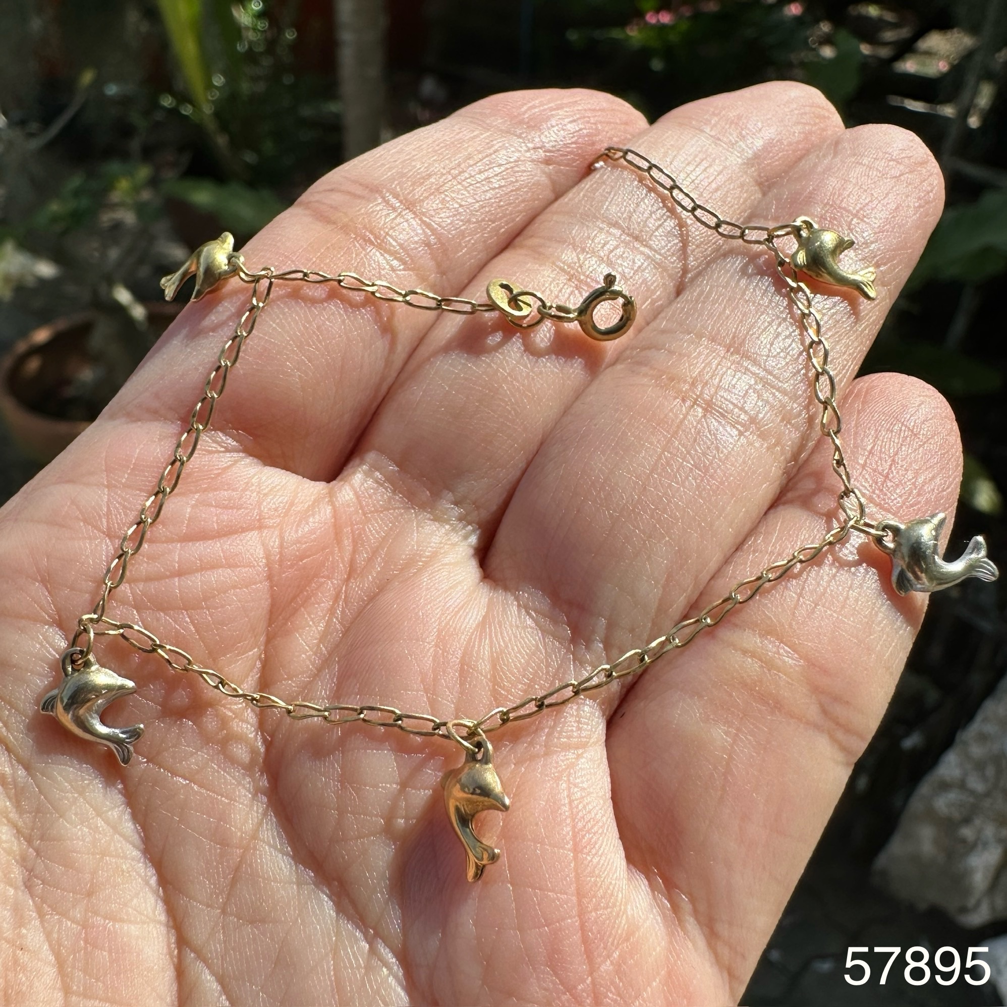 รหัส 57895 สร้อยข้อมือ อิตาลี 750 18 K ลายปลาโลมาตุ้งติ้ง งานสวยมาก นน. 2.36 g