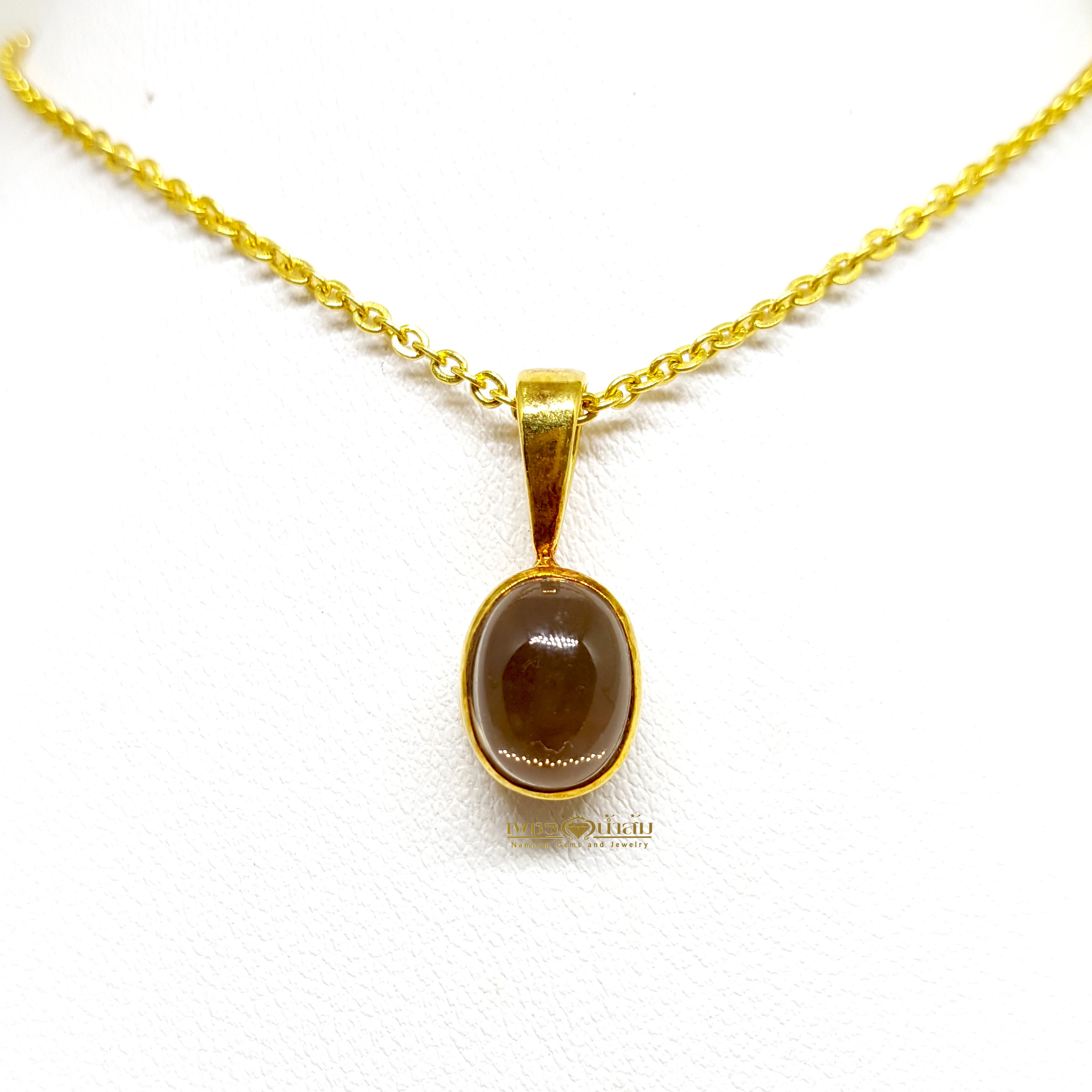 จี้ Smoky Topaz จากบ่อOuro Preto ประเทศ Brazil เจียรทรงคาบาชอน Cabochon