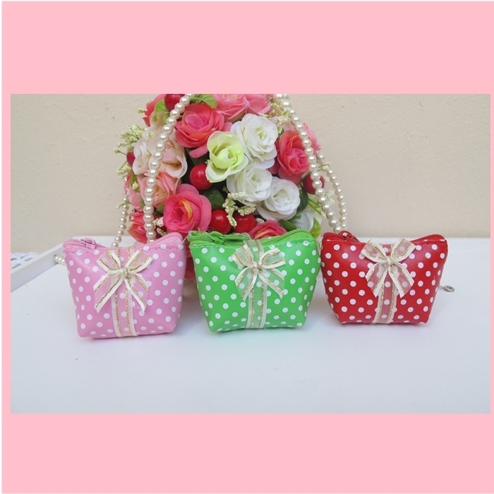 กระเป๋าซิบลายจุดผูกโบว์