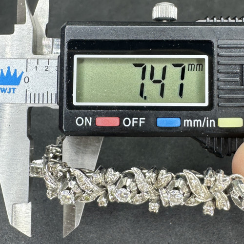 รหัส 63476 สร้อยข้อมือ เพชร 7/0.70 ct ฝังเพชรกุหลาบ 35/0.35 ct งานปาหะ ความยาว 17.50 ซม. นน. 14.32 g