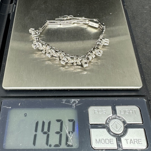 รหัส 63476 สร้อยข้อมือ เพชร 7/0.70 ct ฝังเพชรกุหลาบ 35/0.35 ct งานปาหะ ความยาว 17.50 ซม. นน. 14.32 g