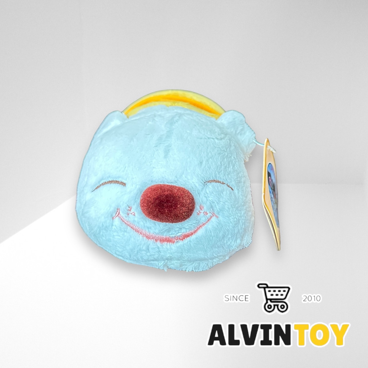 ตุ๊กตาหมาวางโทรศัพท์มือถือ