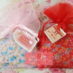 กระเป๋าแป๊กลายผ้าดอกไม้ คละสี แพ็คถุงผ้าแก้ว