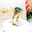 แหวนเพทาย Blue Zircon สีฟ้าสด เล่นลูกเล่นลายไทยทรงดอกประดับฝังด้วยเพชรแท้ บนตัวเรือนทองแท้ทั้งตัวเรือน