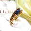 แหวนพลอยไพลิน Blue Sapphire เจียรเหลียมเพชร ฝังฉลุลายทรงไทย บนตัวเรือนทองแท้ทั้งตัวเรือน