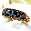 แหวนพลอยไพลิน Blue Sapphire เจียรเหลียมเพชร ฝังฉลุลายทรงไทย บนตัวเรือนทองแท้ทั้งตัวเรือน