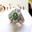 แหวนพลอยซาร์โวไรท์ Tsavorite สีสวยสด ประดับตกแต่งด้วยเพชรแท้เป็นลวดลายศิลปะสมัย Art Nouveau บนตัวเรือนทองแท้ทั้งตัวเรือน