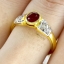 แหวนพลอยทับทิม Ruby สีเลือดนก ประดับตกแต่งด้วยเพชรแท้บ่าข้างทรงแบเก็ต ขันบรรได บนตัวเรือนทองแท้ทั้งตัวเรือน