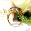 แหวนพลอยไพลิน ยี่หร่า หรือ "นิหล่า" Blue Sapphire เม็ดใหญ่ เจียรนัยแบบหลังเบี้ย มีสีสันที่นุ่มนวลชวนมอง และให้ความรู้สึกเย็นตาเย็นใจ