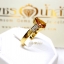 แหวนพลอยบุษราคัม Yellow Sapphire ฝังทรงหยกน้ำ ตกแต่งเพชรแท้ที่บ่าข้าง ดูเรียบหรู บนตัวเรือนทองแท้ทั้งตัวเรือน