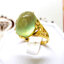 แหวนพลอยพรีไนท์ Prehnite จันทร์ เจียรหลังเบี้ย สีเขียวอ่อนวาวใส บนตัวเรือนทองแท้ ฉลุลาย