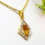 จี้บุษราคัม Yellow Sapphire ตกแต่งล้อมด้วยเพชรแท้ น้ำงาม ดีไซน์เป็นทรงหลามตัดของใพ่