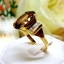 แหวนเพทายดิบสีแชมเปญ Champagne Zircon ประดับตกแต่งด้วยเพชรแท้บ่าข้าง บนตัวเรือนทองแท้ทั้งตัวเรือน